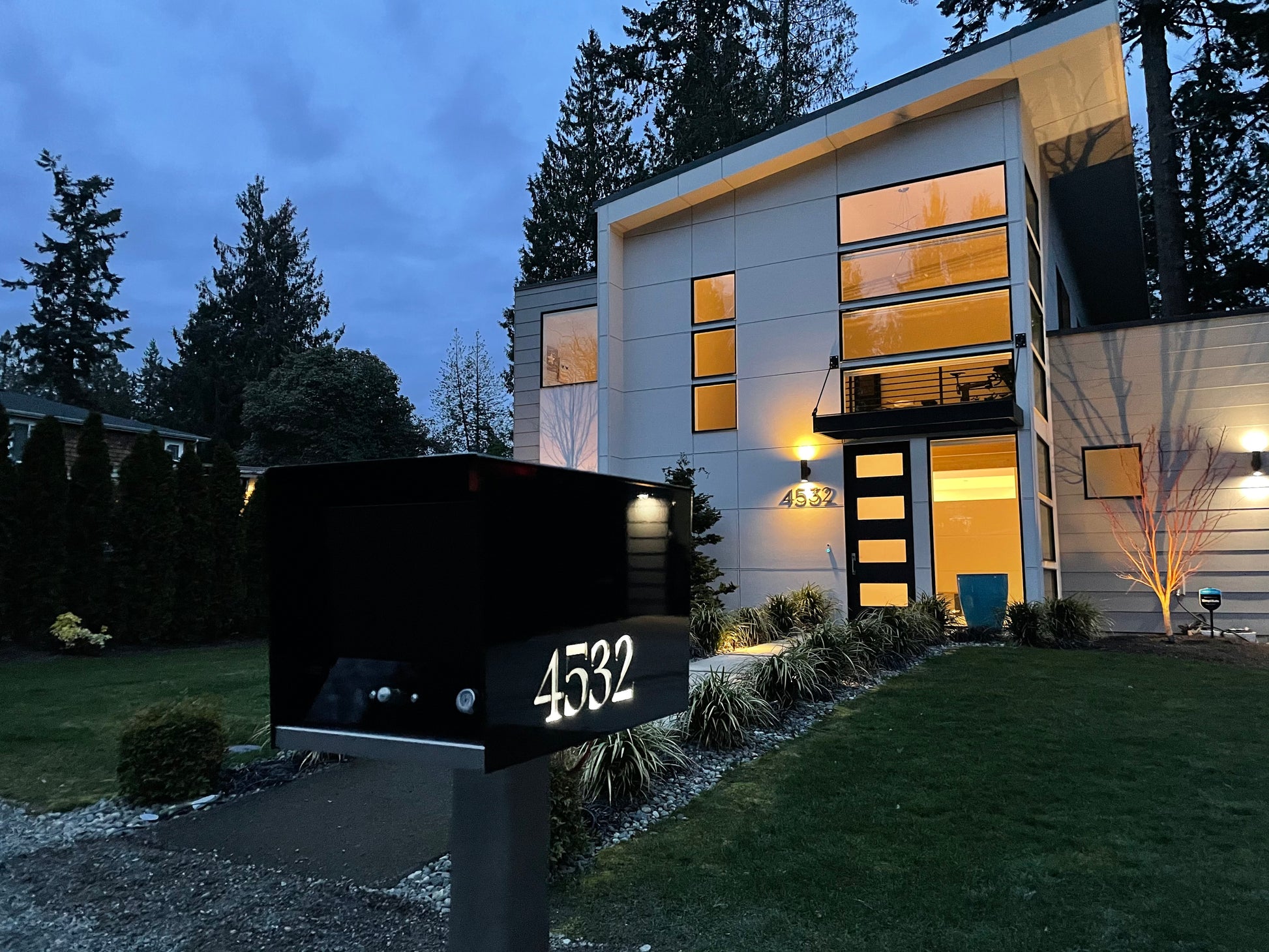 The Original UptownBox in JET BLACK - Modern Mailbox black at night